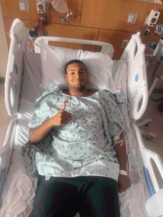Injured high school football player recovering at hospital