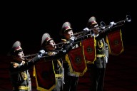 North Korea holds military parade, shows off new intercontinental missile