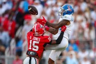 The Latest: Three ranked matchups in the AP Top 25 headline next weekend