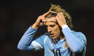 Diego Forlan rushed to hospital with tear in his lung in veterans match injury