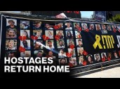 Live: Freed Israeli hostages arrive at Reim military base