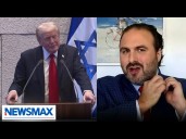 Israel advocate removes pin after living hostages released from Trump deal