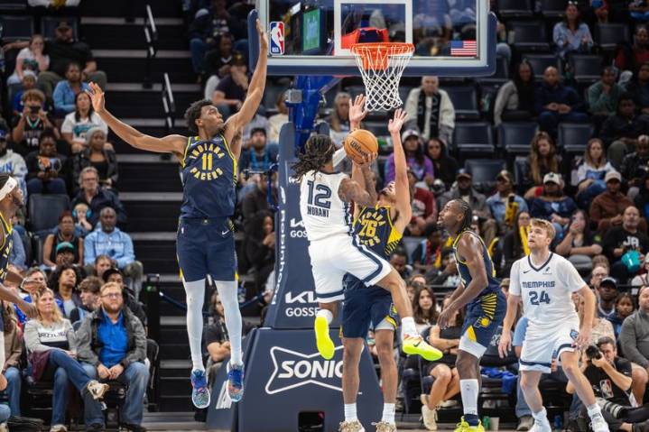NBA roundup: Nikola Jokic's triple-double leads Nuggets in home opener