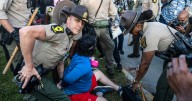 Noem visits Chicago-area ICE facility as agents detain multiple protesters outside