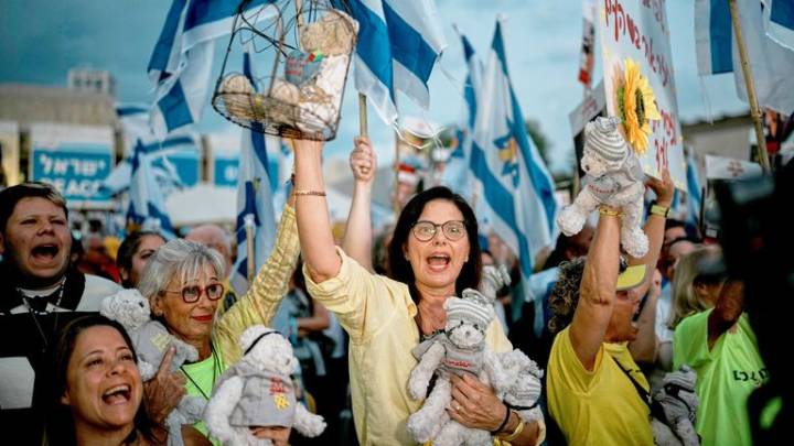 Chants of frustration turn into songs of celebration in Tel Aviv as crowds greet hostages