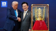 A gold crown, ketchup and the YMCA: Trump's welcome to South Korea