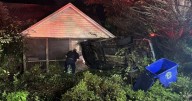 UPDATE: Car crashes into Red Bank home, road reopened