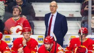 Flames lock up head coach for 2 more years