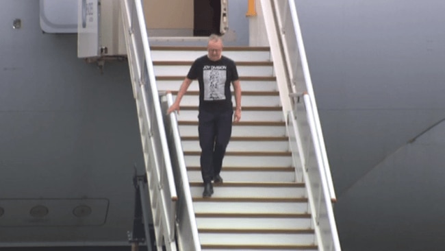 Anthony Albanese asked media not to film him wearing Joy Division T-shirt while disembarking from plane after US trip