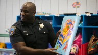 Trial begins for Wilmington police officer who struck handcuffed woman