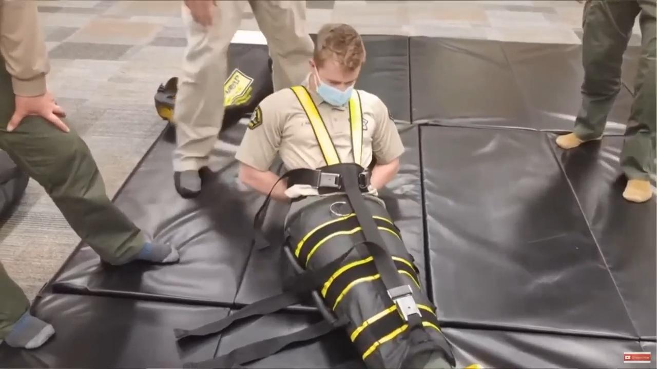 ICE's use of full-body restraints during deportations raises concerns over inhumane treatment