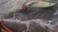 Video shows surfer being rescued by RNLI after powerful rip current dragged him out to sea