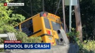 School bus crashes down embankment in Whitehall Township, Pa.