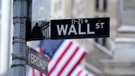 Wall Street shrugs at government shutdown while weak hiring jolts bond market