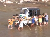 J-K: Locals carry auto rickshaw on shoulders after key bridge...