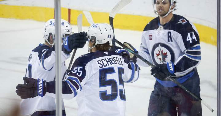Toews scores his first as Winnipeg Jets come back to beat Flames 2
