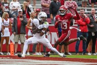 Reed throws for 280 yards and 3 TDs, runs for another score as No. 4 Texas A&M beats Arkansas 45