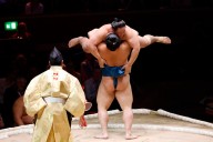 Flipping sumo wrestlers get London tournament rolling
