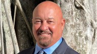 Flags flying at half-staff to honor memory of Commissioner Mike Greenwell
