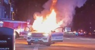 Boston police cruiser torched during "large-scale vehicle takeover" involving 100+ people