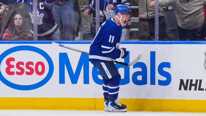 Domi scores twice, lifts Maple Leafs past Flames