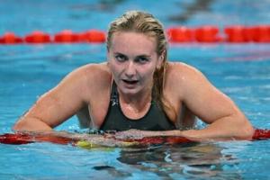 ‘Living legend’ Ariarne Titmus announces retirement from swimming