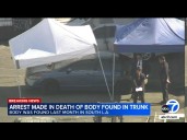 Arrest made after body found in car at South LA tow yard