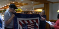 Volunteers present handmade quilts to Tennessee Vietnam era veterans