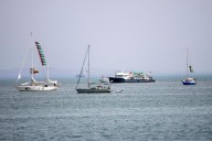 Flotilla activists approach Gaza and say they are ready for a possible Israeli interception