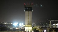 Delays spread to major airports across the country, as the seventh day of government shutdown impacts travelers