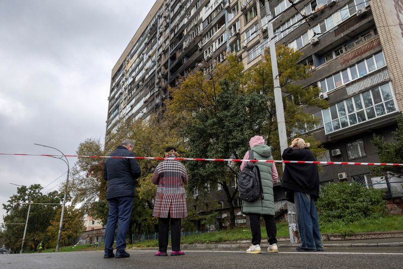 Parts of Kyiv plunged into darkness after mass Russian attack