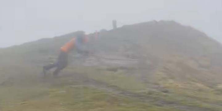 Watch: Man takes stroll on French mountain peak amid 115 mph win