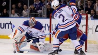 Oilers’ Evan Bouchard called out by coach after loss to Islanders