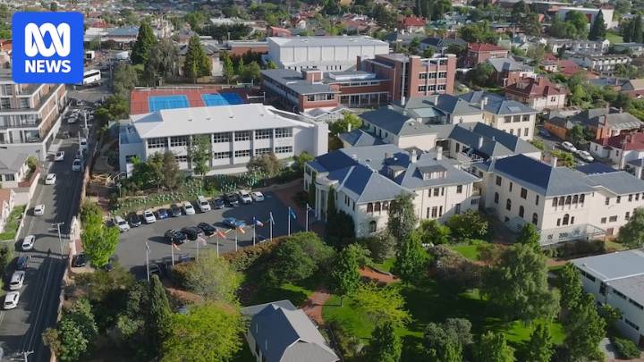 Friends' School staff member charged with child abuse offence after Hobart raids