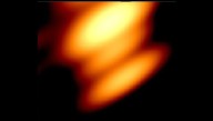 First-Ever Image Of Two Black Holes Orbiting Each Other Captures "Peculiar" Quasar