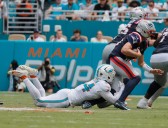 Dolphins' young trench players off to uneven start