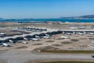 2 dead after cargo plane skids off runway and into sea at Hong Kong International