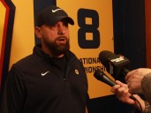 Queen's coach intentionally grounds questions about players' conduct