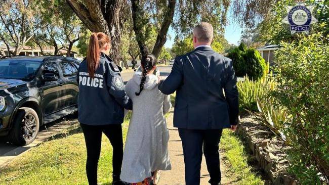 23-year-old Sydney woman charged after allegedly running online accounts sharing extremist content 'glorifying martyrdom'