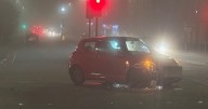Edinburgh car crash leaves banged up vehicle in middle of busy junction in thick fog