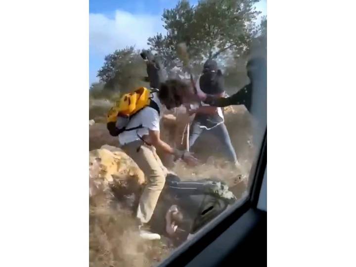 Israeli settlers beat Palestinian farmers amid olive harvest