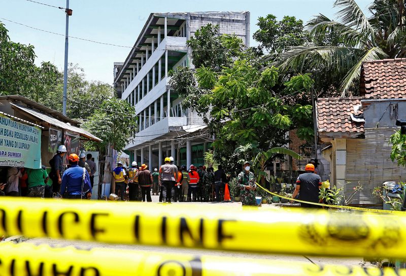 'Maybe there's hope': Indonesian rescuers race against time to save students trapped under collapsed school