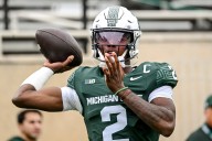 Deadspin | Michigan State QB Aidan Chiles out after hit vs. UCLA