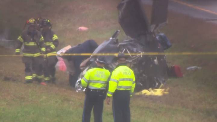 Plane crashes onto a Massachusetts highway, killing 2 and wounding 1 on the ground