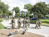 Appeals court allows federalized National Guard, but leaves block on Chicago deployment in place