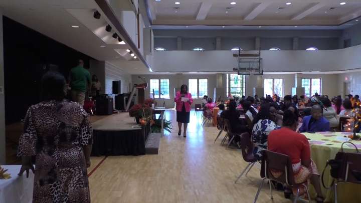 A group awarded two students with scholarships