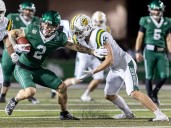 Huskies, with Farrell in command, beat Bears to keep grip on first place