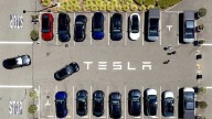 Parents of college student killed in Tesla crash allege design flaw trapped her in the burning car