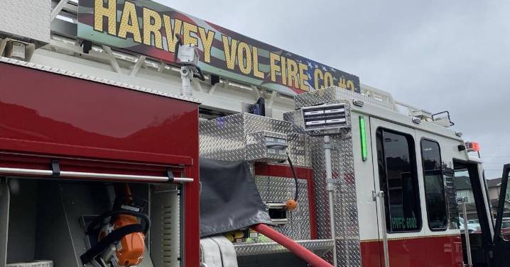 2-alarm fire aboard barge in Harvey's industrial canal under control; Peters Road still closed