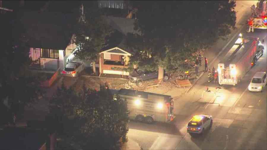 Car crashes into side of Denver home Friday morning